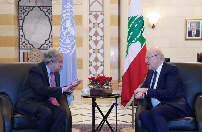  United Nations Secretary-General Antonio Guterres gestures as he talks with Lebanon's Prime Minister Najib Mikati in Beirut, Lebanon December 20, 2021 (photo credit: DALATI NOHRA/HANDOUT VIA REUTERS)