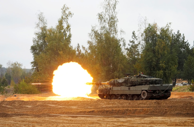  Spanish army tank Leopard 2 of NATO enhanced Forward Presence battle group fires during the final phase of the Silver Arrow 2022 military drill on Adazi military training grounds, Latvia September 29, 2022.  (photo credit: INTS KALNINS / REUTERS)