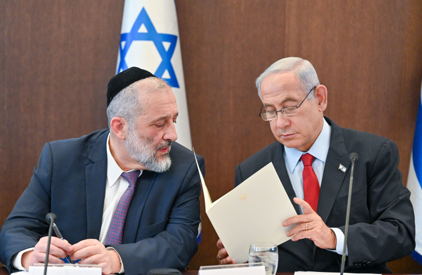  Prime Minister Benjamin Netanyahu seen with Arye Deri in a cabinet meeting in Jerusalem on January 22, 2023 (photo credit: KOBI GIDEON/GPO)