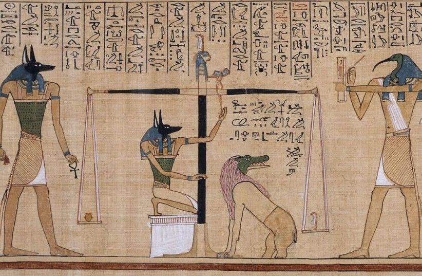  The Weighing of the Hearts, as seen in an illustration within a copy of the ancient Egyptian Book of the Dead. (photo credit: Wikimedia Commons)