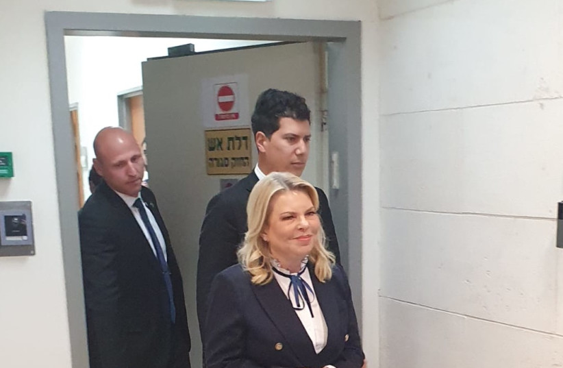 Sara Netanyahu entering the courtroom before testifying in a defamation lawsuit, January 23, 2023. (credit: REUVEN KASTRO)