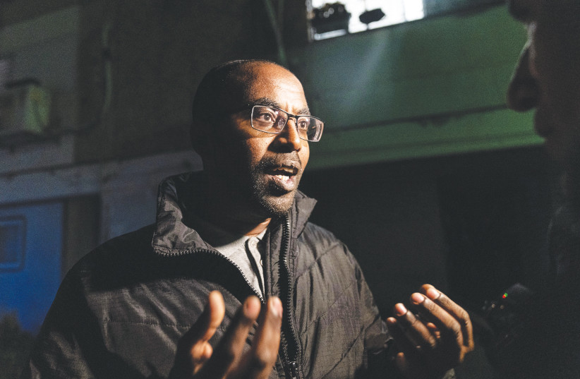 ILAN ​​MENGISTU holds a news conference in Ashkelon after Hamas released a video of his brother Avera, last week.  (photo credit: FLASH90)