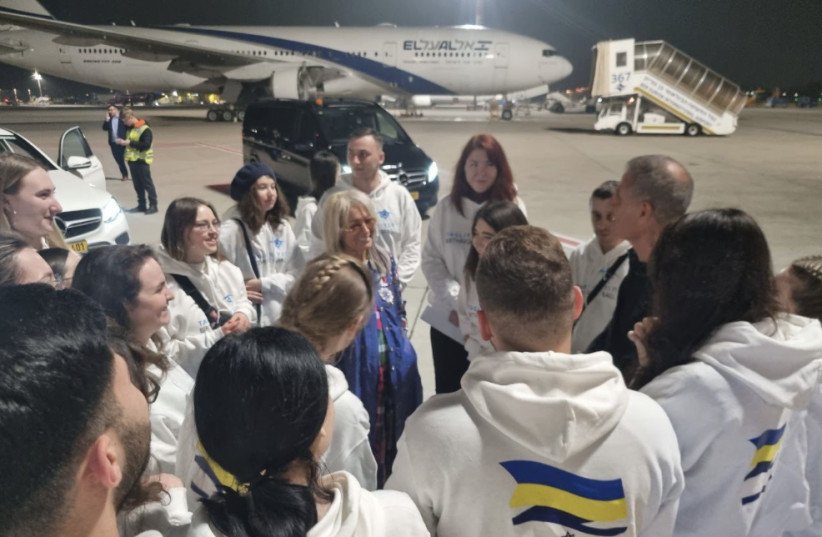 Dr. Miriam Adelson and Gidi Mark with the group, right after landing at Ben Gurion International Airport. (credit: BIRTHRIGHT ISRAEL)