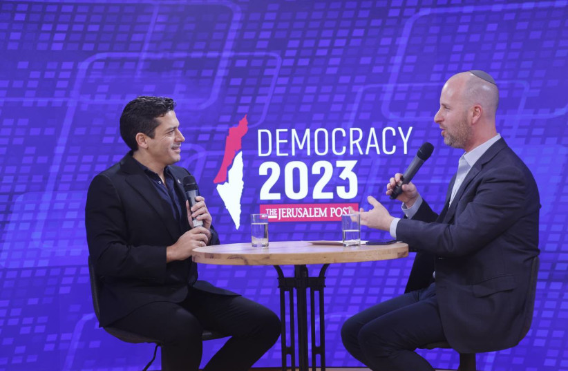  Diaspora Minister Amichai Chikli in conversation with The Jerusalem Post Editor-in-Chief Yaakov Katz at the Democracy 2023 conference. (photo credit: MARC ISRAEL SELLEM)