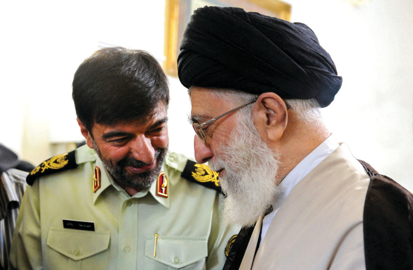 Iran’s Supreme Leader Ayatollah Ali Khamenei meets the new chief of the Iranian police force, Ahmad-Reza Radan, in Tehran, in this picture obtained on January 7, 2023, from the Office of the Iranian Supreme Leader. (credit: WANA/REUTERS)