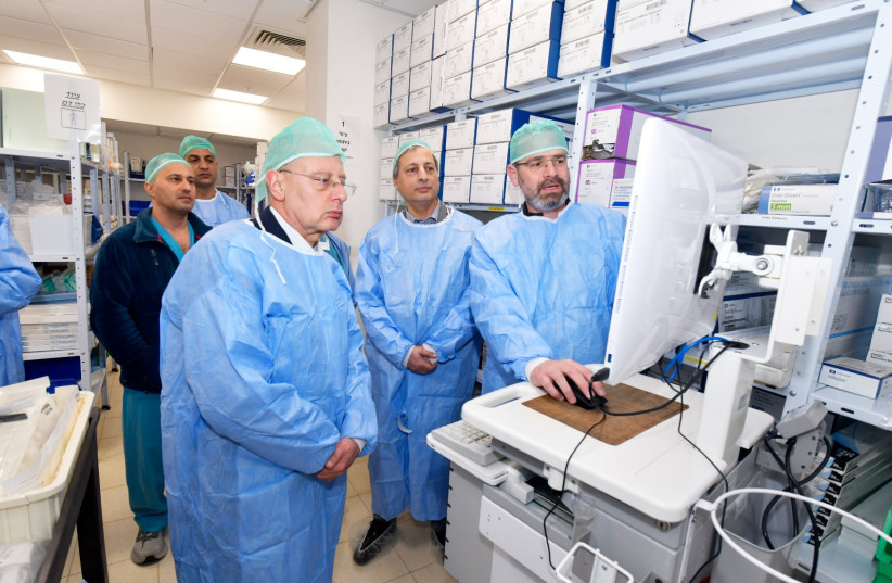  From left to right:  Prof. Masad Barhoum, director-general of the Galilee Medical Center ; Avi Buskila, CEO, Sarel;  Yoav Kastel, CEO, Autonomi. (photo credit: RONI ALBERT)