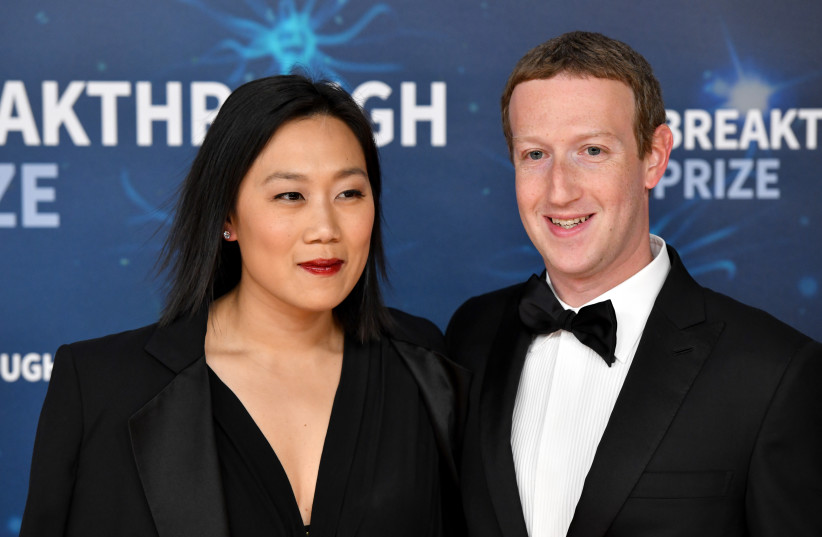  Priscilla Chan and Mark Zuckerberg attend the 2020 Breakthrough Prize Red Carpet at NASA Ames Research Center in Mountain View, California on Nov. 3, 2019. (photo credit:  Ian Tuttle/Getty Images for Breakthrough Prize)