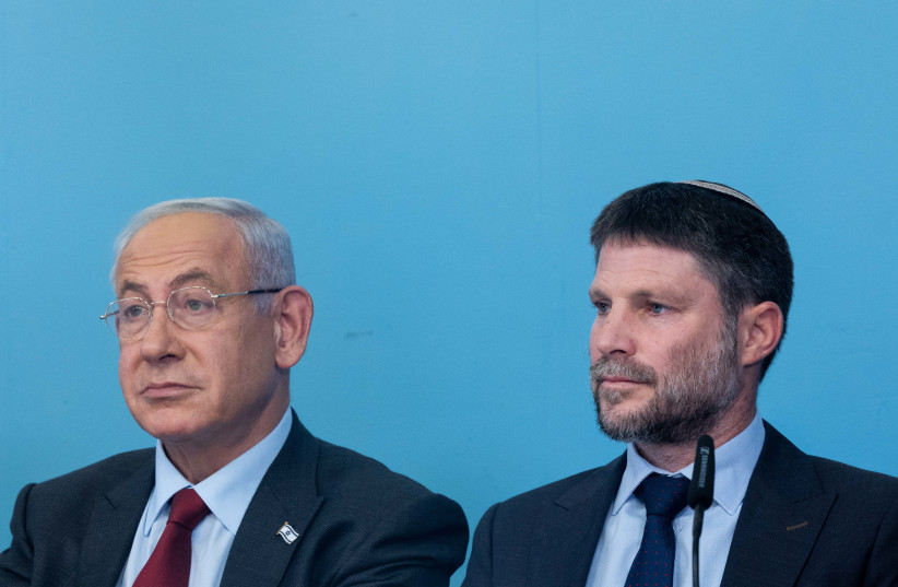  Israeli Prime Minister Benjamin Netanyahu and Finance Minister Bezalel Smotrich seen during a press conference, at the Prime Minister's office in Jerusalem, on January 25, 2023. (photo credit: YONATAN SINDEL/FLASH90)