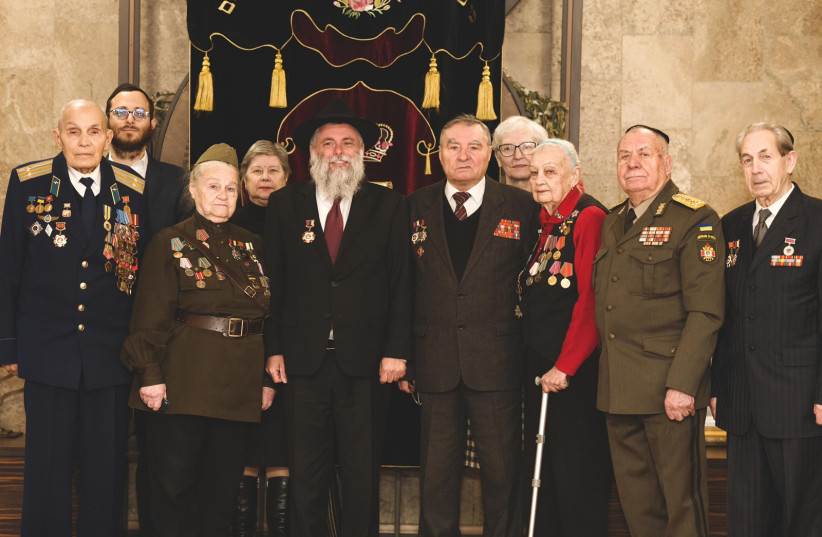   Rabbi Jonatan Markovich and the Ukrainian World War  II veterans on Wednesday. (credit: JCC Kyiv Jewish Community)
