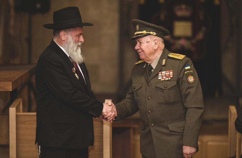   Rabbi Jonatan Markovich and the Ukrainian World War  II veterans on Wednesday. (photo credit: JCC Kyiv Jewish Community)