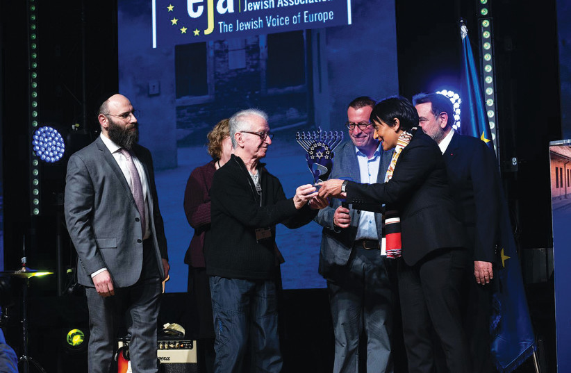  THERESIENSTADT SURVIVOR Gidon Lev gives the King David Award to Amanda Rajkumar, executive board member for Global Human Resources, People and Culture of Adidas on January 23, 2022, for the company’s decision to sever all commercial ties with singer Kanye West following his antisemitic statements. (credit: YOAV DUDKEVITCH)