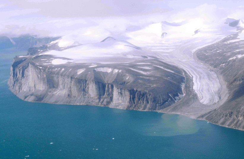  Tongue of a glacier in the Remote Peninsula; western shoreline of Sam Ford Fjord about 15 km (9.3 mi) from its mouth. Northeast coast of Baffin Island north of Community of Clyde River, Nunavut, Canada, from above. (photo credit: Ansgar Walk/Wikimedia Commons)