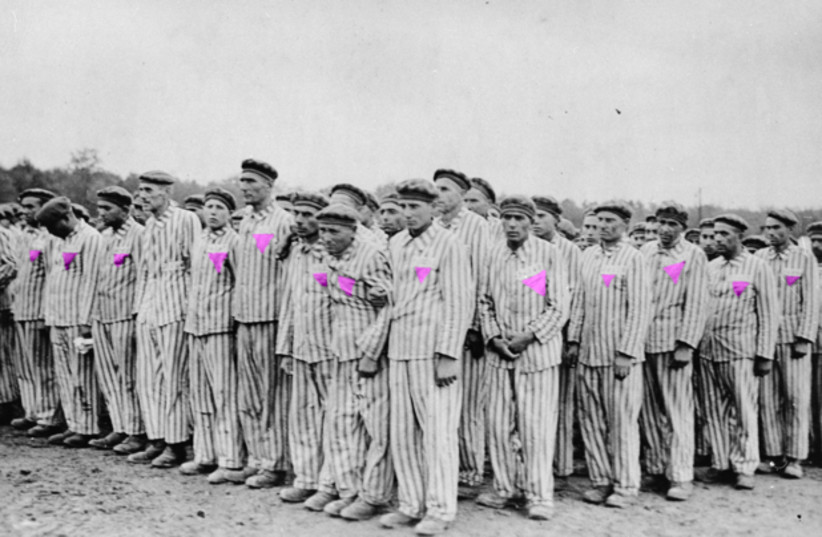  Colorized image of gay prisoners standing for role-call at Buchenwald Concentration Camp during the Holocaust. (credit: Wikimedia Commons)