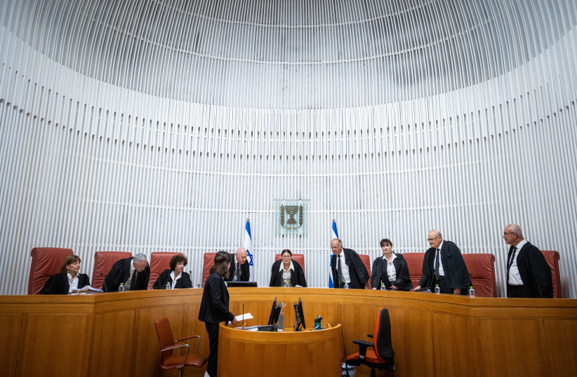  Supreme Court Chief of Justice Ester Hayut and Supreme court justices arrive for a court hearing at the Supreme Court in Jerusalem, on the election committee decision to disqualify Balad from running in the upcoming Knesset election, October 6, 2022.  (credit: YONATAN SINDEL/FLASH90)