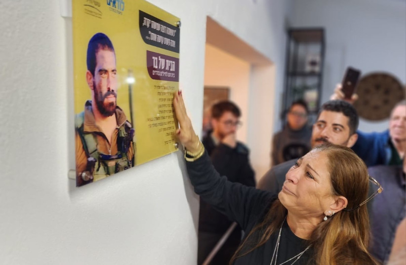  Dalia Falah, mother of the late Maj. Bar Falah, attends the dedication of "Bar's House" home for lone soldiers in Lod. (photo credit: COURTESY OF OSEY CHAIL)