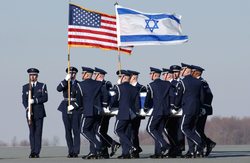 The remains of Israeli astronaut Ilan Ramon are carried by an honor guard after arrival at Dover Air Force Base in Dover, Delaware, February 5, 2003. (credit:  REUTERS/HANDOUT/NASA PHOTO BY RENEE BOUCHARD)