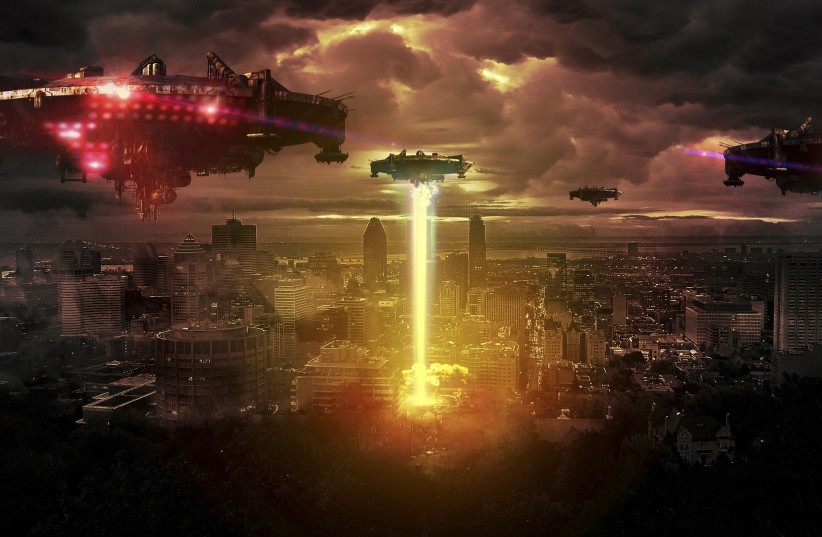  Alien UFOs are seen attacking a city on Earth in this illustrative image. (photo credit: PIXABAY)