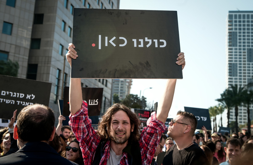  Workers of the Israeli Broadcasting Corporation "KAN" and supporters protest against the new government's intention to close "KAN", in Tel Aviv, January 25, 2023.  (photo credit: AVSHALOM SASSONI/FLASH90)