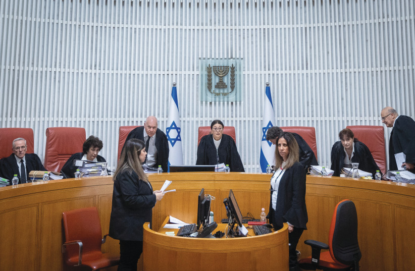 Supreme Court President Esther Hayut and justices arrive for a hearing on the annulment of Deri’s ministerial appointment due to his recent conviction on tax offenses, Jan. 5.  (credit: YONATAN SINDEL/FLASH90)