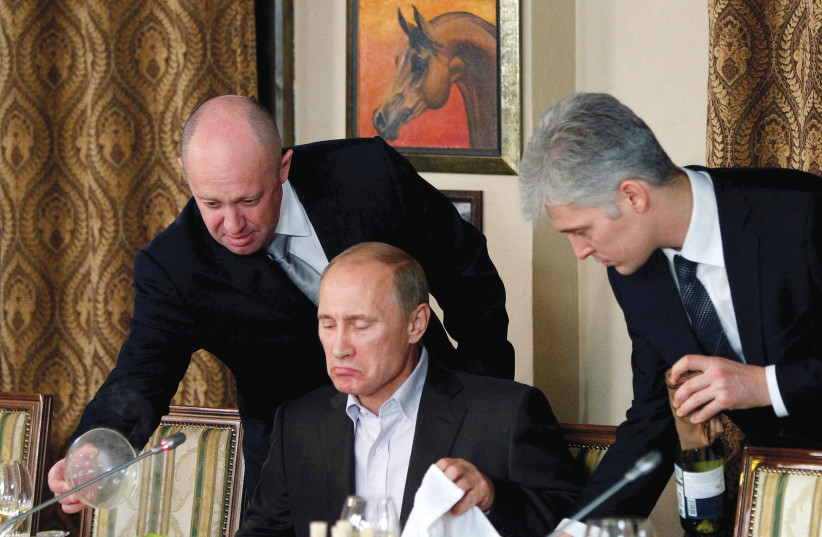  RUSSIAN PRIME MINISTER Vladimir Putin dines at Cheval Blanc outside Moscow.  (photo credit: Misha Japaridze/Reuters)