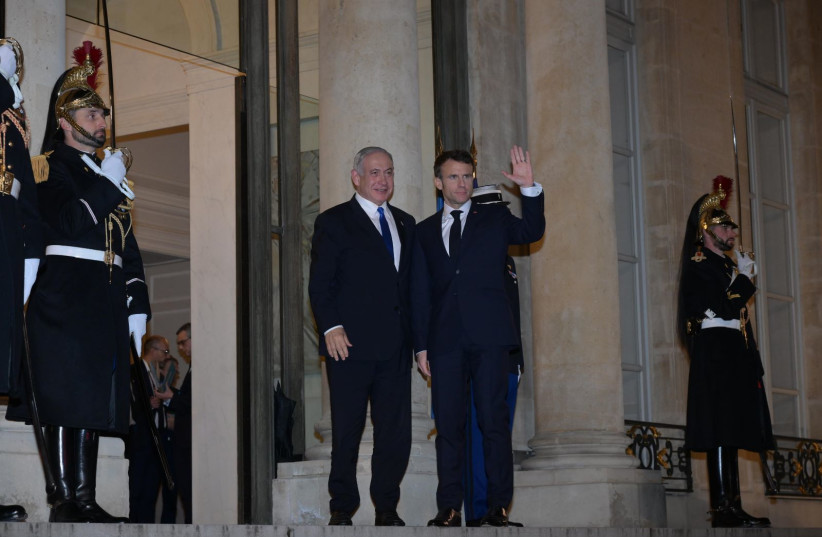  Israeli PM Netanyahu and French President Macron at the Champs Elysee in Paris. (credit: AMOS BEN-GERSHOM/GPO)