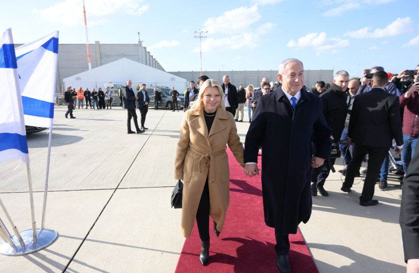  PM Netanyahu and his wife Sarah on the way to their flight to Paris. (credit: AMOS BEN-GERSHOM/GPO)