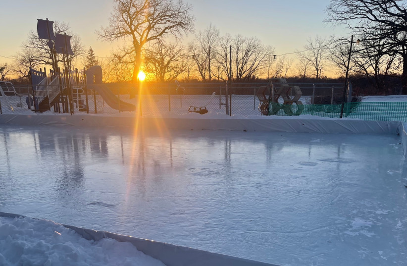  The sun sets ahead of the Klezmer on Ice Festival's opening night, which features a free skate session at Temple of Aaron's ice rink.  (credit: Courtesy of Marcus Rubenstein)