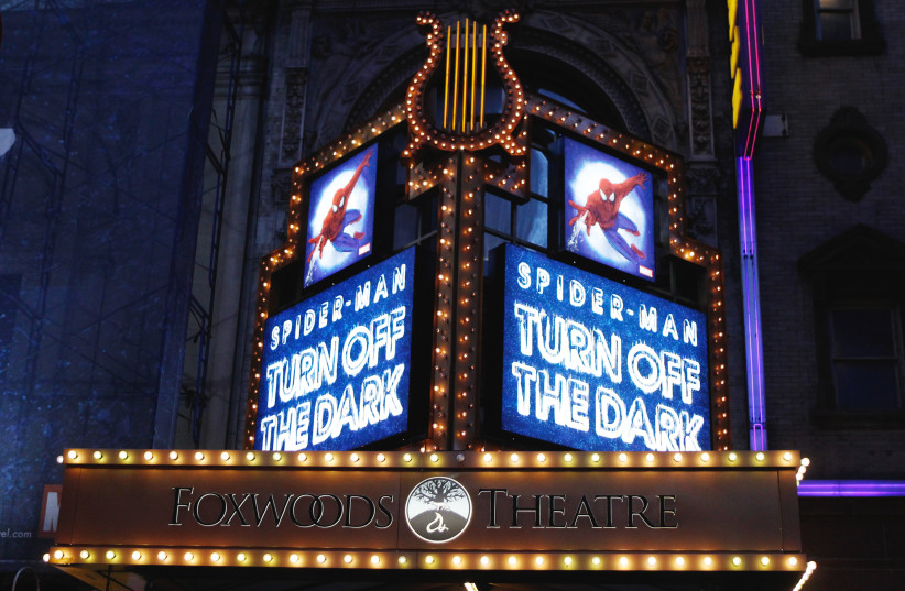  Banners advertising the Broadway play ''Spiderman: Turn Off The Dark'' shine in front of the Foxwoods Theater in New York December 23, 2010. (credit: REUTERS/LUCAS JACKSON)