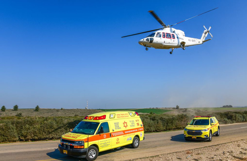  Hatzolah Air Medivac Helicopter simulation with Magen David Adom ambulance in Israel. (photo credit: Courtesy of Magen David Adom)