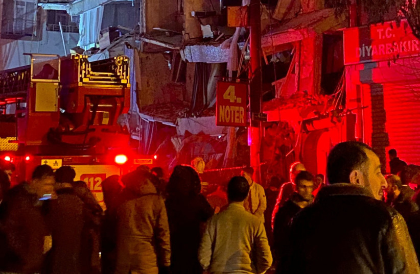  An emergency crew attends to a partially collapsed building following an earthquake in Diyarbakir, Turkey February 6, 2023 in this picture obtained from social media. (credit: AYSENUR VIA REUTERS)