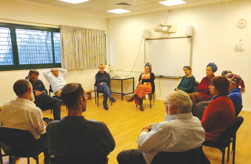  OHR TORAH Stone principals and educators break into discussion groups at the end of the visit to the psychiatric treatment facility.  (photo credit: OHR TORAH STONE)