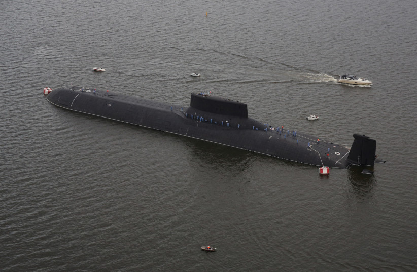  An aerial view shows the Russian nuclear submarine Dmitry Donskoy moored on the eve of the the Navy Day parade in Kronshtadt, a seaport town in the suburb of St. Petersburg, Russia, July 28, 2017. (photo credit: REUTERS/ANTON VAGANOV)