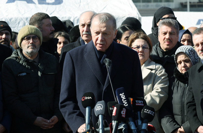 Turkish President Tayyip Erdogan talks to media in the aftermath of a deadly earthquake in Kahramanmaras, Turkey, February 8, 2023. (photo credit: PRESIDENTIAL PRESS OFFICE/HANDOUT VIA REUTERS)
