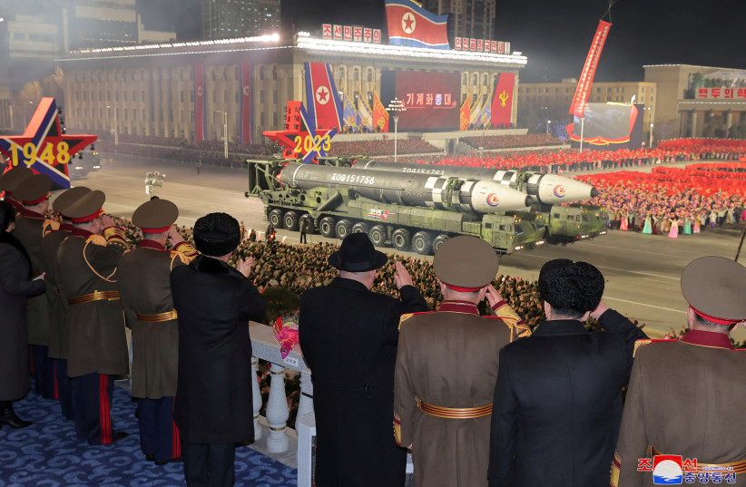  North Korean leader Kim Jong Un watches as missiles are displayed during a military parade to mark the 75th founding anniversary of North Korea's army, at Kim Il Sung Square in Pyongyang, North Korea February 8, 2023, in this photo released by North Korea's Korean Central News Agency (KCNA). (credit: KCNA/REUTERS)