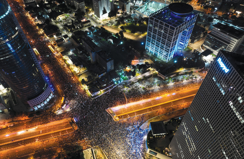  A view of the massive demonstration in Tel Aviv on January 21.  (credit: ILAN ROSENBERG/REUTERS)