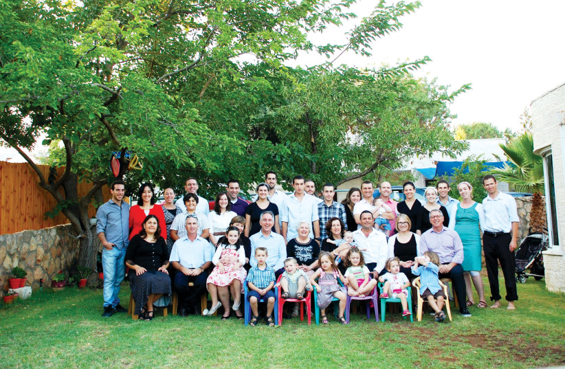  WITH MANY of Leonore’s offspring, 2012. (credit: Courtesy Shavei-Tzion family)