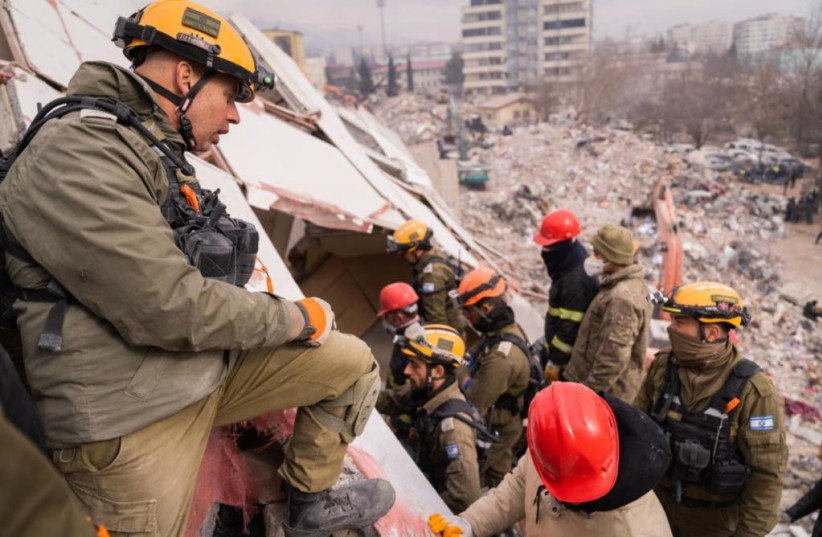 Israeli rescue workers are seen in Turkey amid devastating earthquakes in the country, as part of IDF's Operation Olive Branch (credit: IDF SPOKESPERSON'S UNIT)