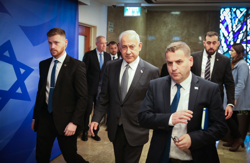  Israeli Prime Minister Benjamin Netanyahu arrives to a cabinet meeting at the Prime Minister's Office in Jerusalem on February 12, 2023. (photo credit: AMIT SHABI/POOL)