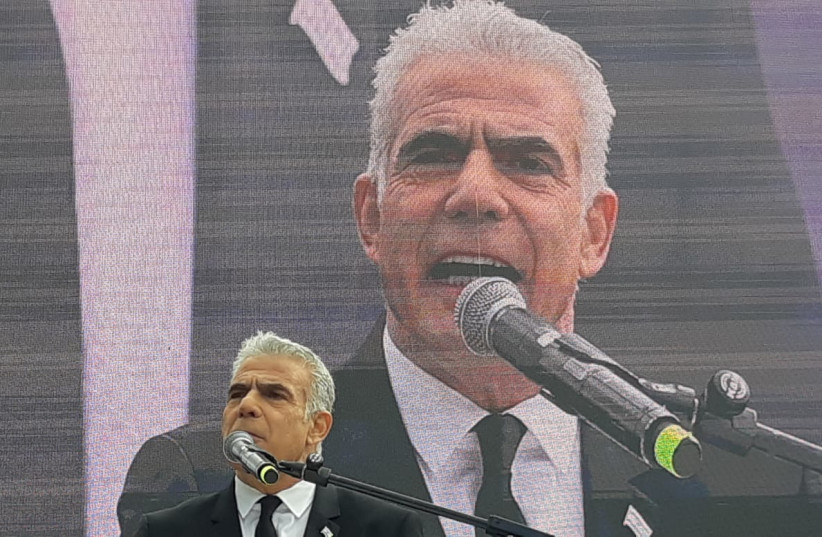  Opposition Leader Yair Lapid delivers a speech at the protest outside the Knesset against the judicial reform. (photo credit: MARC ISRAEL SELLEM)
