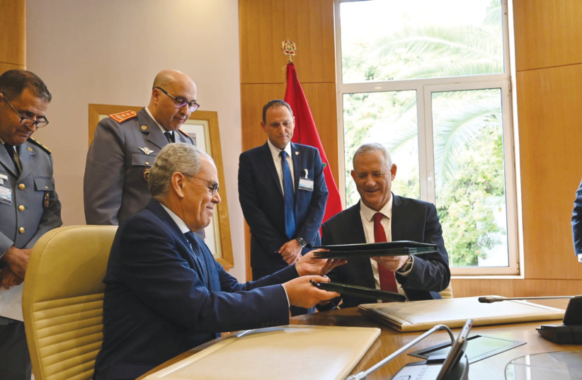  THEN-DEFENSE Minister Benny Gantz and Morocco’s Defense Administration Minister Abdellatif Loudiyi sign a defense memorandum in Rabat, in 2021. (credit: ISRAEL DEFENSE MINISTRY)
