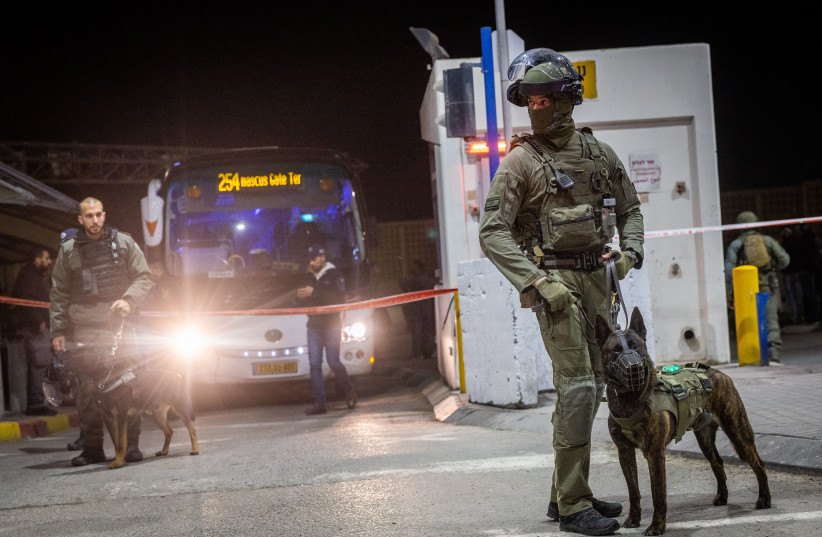  Israeli security at the scene of a terror attack, when an Israeli border police was critically hurt in a stabbing attack at a checkpoint in Shuafat, East Jerusalem. February 13, 2023 (credit: YONATAN SINDEL/FLASH90)