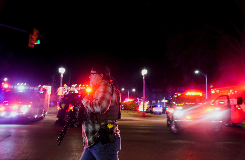  Emergency personnel respond to a shooting at Michigan State University in East Lansing, Michigan, U.S., February 13, 2023 (credit: REUTERS/DIEU-NALIO CHERY)