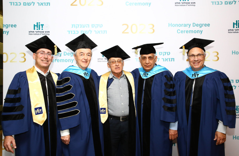  From right to left: Prof. Adir Pridor, Chairman of HITS’s  Executive Committee, Pinchas (Pini) Cohen, Chairman of the Board of Trustees of HIT, Moti Sasson, Mayor of Holon, HIT President Professor Eduard Yakubov, and Shmuel Goldberg, HIT CEO.   (photo credit: OFER AMRAM)