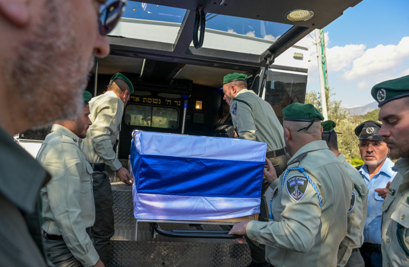  Family and friends attend the funeral of Border Police officer Asil Suaed who was killed in a stabbing attack last night at the Shuafat checkpoint, in Huseiniya , northern Israel, on February 14, 2023.  (photo credit: MICHAEL GILADI/FLASH90)