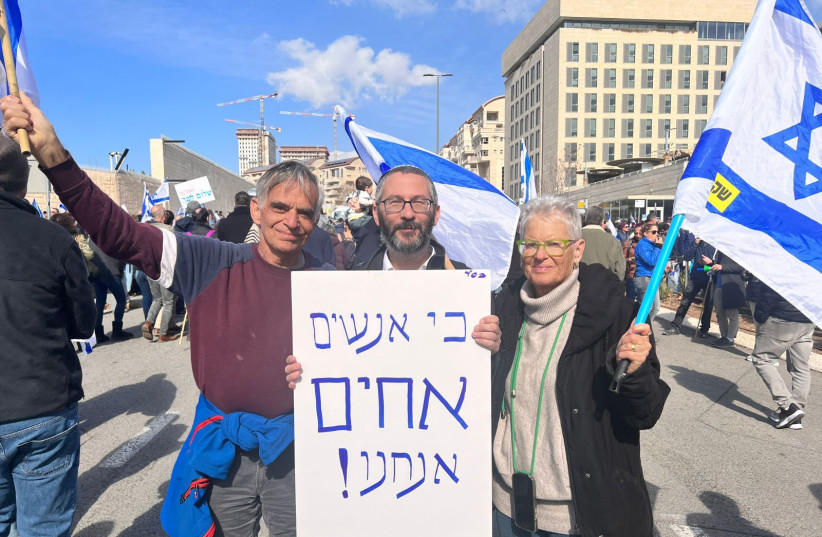  Ya'akov Neuman calls for unity between the people of Israel at the protest on Monday. (credit: Yair Amit)