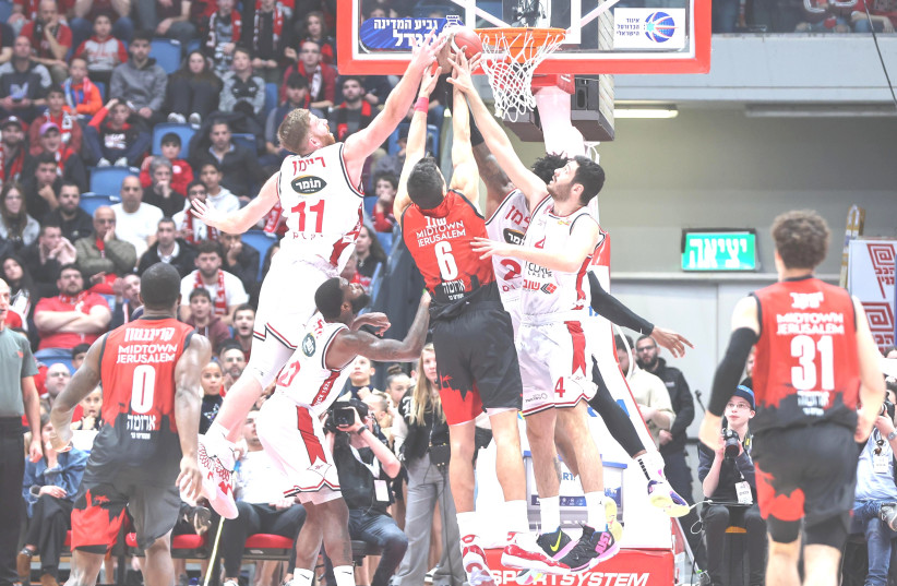  ITAY SEGEV (left picture, 6) and Hapoel Jerusalem overcame Hapoel Haifa 77-73 in their State Cup semifinal. (photo credit: Liron Moldovan)