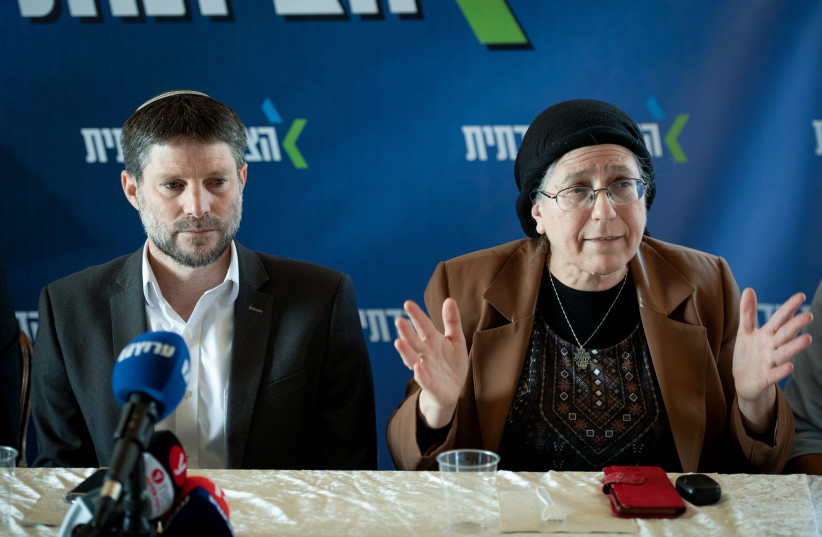  Minister of Finance and Head of the Religious Zionist Party Bezalel Smotrich and Orit Strock, National Mission Minister at a faction meeting in the Jewish settlement of Givat Harel, in the West Bank, February 14, 2023.  (photo credit: SRAYA DIAMANT/FLASH90)