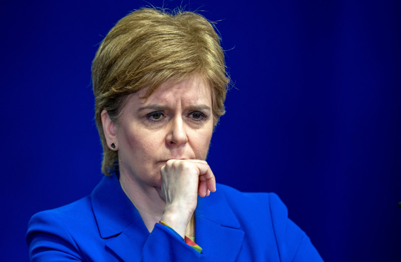   First Minister of Scotland Nicola Sturgeon reacts as she answers questions on Scottish Government issues, during a news conference at St Andrews House, in Edinburgh, Britain February 6, 2023.  (photo credit: JANE BARLOW/POOL VIA REUTERS/FILE PHOTO)