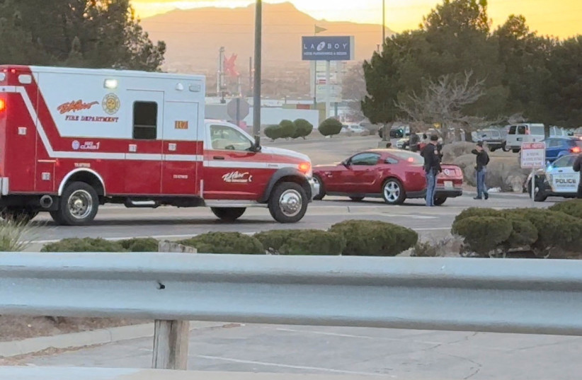 An ambulance arrives as law enforcement officials stand outside the Cielo Vista Mall, after the police said that they were responding to shots that were fired inside the food court of the mall, in El Paso, Texas, US, February 15, 2023, in this screen grab obtained from a social media video. (credit: TWITTER/@ThatVatoJaime/VIA REUTERS)