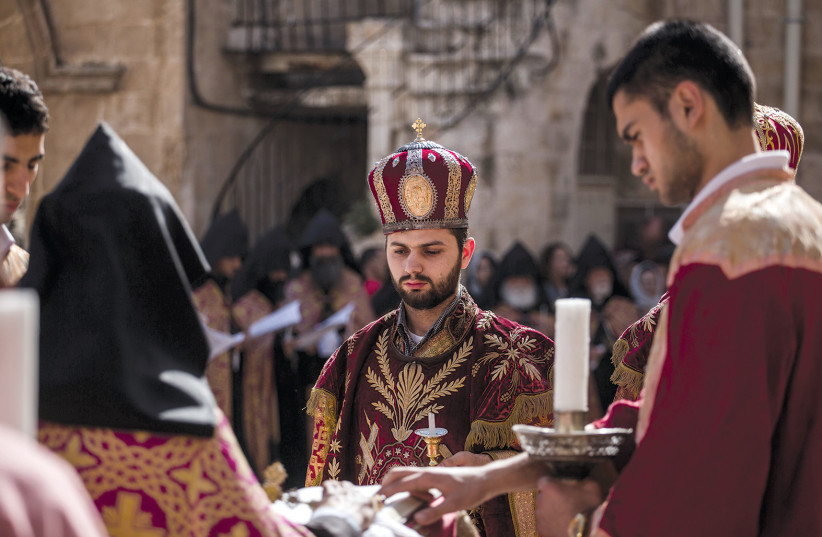  ARMENIAN PRIESTS and clergy perform the Blessing of the Four Corners ceremony during Easter Sunday prayers, outside Saint James Church in the Old City’s Armenian Quarter. (photo credit: HADAS PARUSH/FLASH90)
